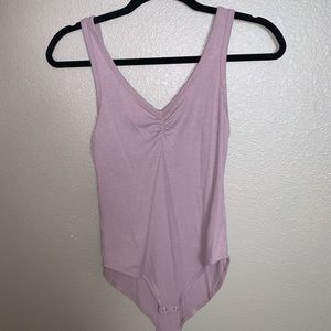 Purple body suit